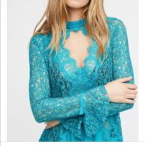 Free people tell a tale lace tunic